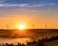 Sunrise over wind mills