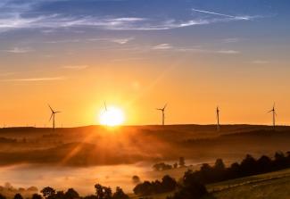 Sunrise over wind mills